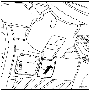 Déclipser le cache sous le volant.