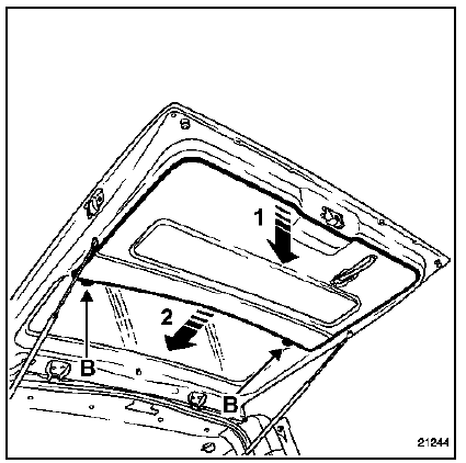 Débrancher les deux connecteurs (b) du faisceau de