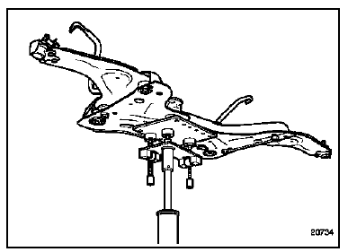 Mettre en place le vérin d'organes sous le berceau et